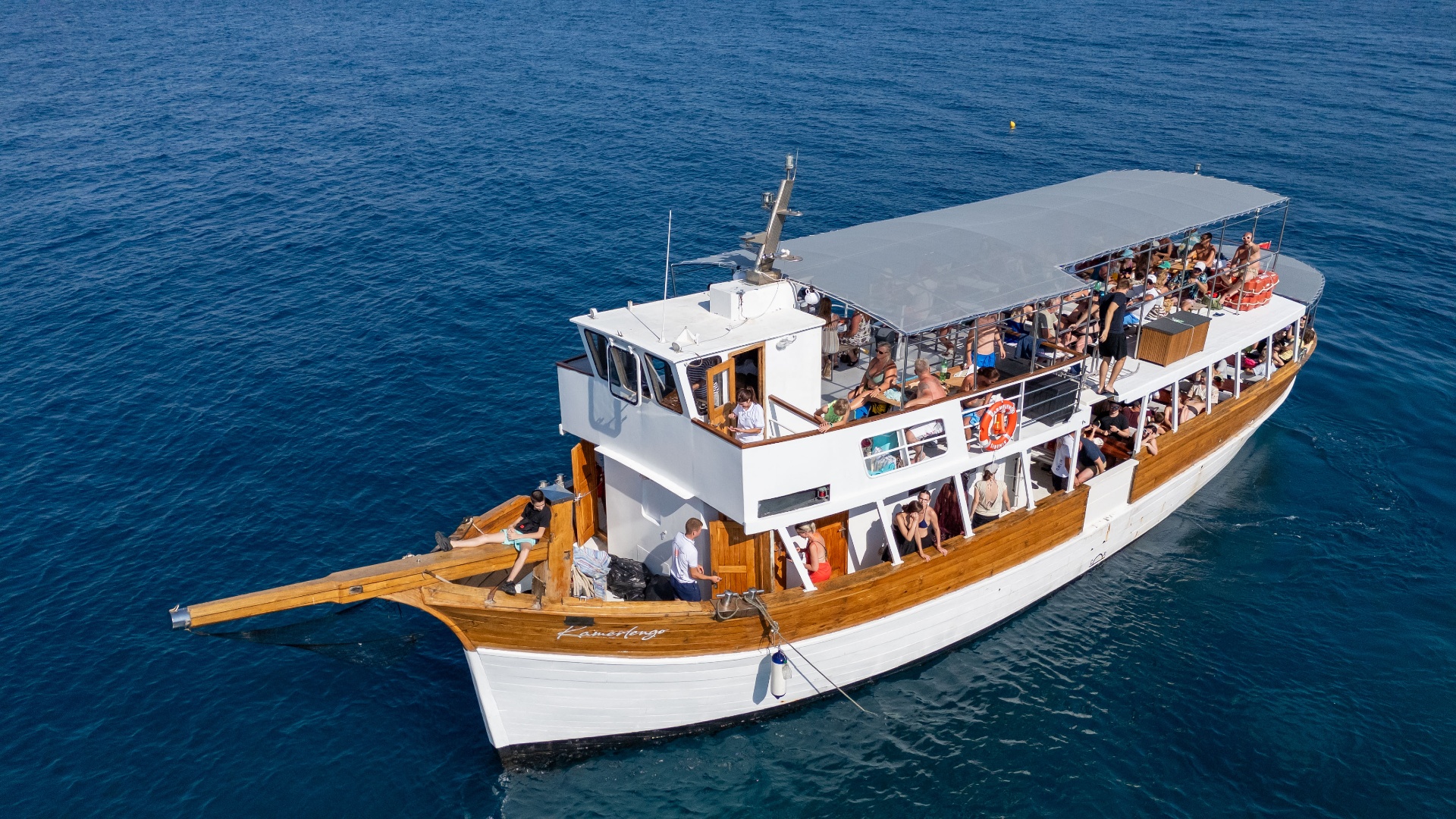 Aerial view of the Kamerlengo wooden boat full of guests on the Adriatic